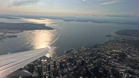 Looking-at-Seattle,-Washington-out-the-window-of-an-airplane