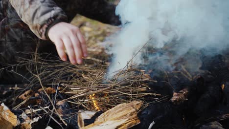 Making-Fire-in-Forest-from-Branches