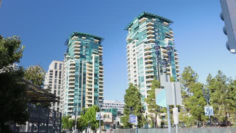 4K-Video-of-Twin-Towers-Amidst-Green-Trees-under-Blue-Skies-in-Downtown-San-Diego-on-a-warm-September-day-in-2023
