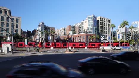 4K-Still-Shot-of-Gaslamp-Quarter-Sign-in-San-Diego-with-Trolley-and-Cars-Passing-by-Under-Blue-September-Sky-on-9-26-23