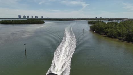 Reverse-aerial-video-of-Lovers-Key-and-boaters