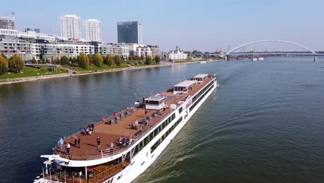 Bratislava,-Slovakia,-Touristic-Cruise-Boat-Sailing-in-Danube-River-on-Sunny-Autumn-Day,-Static-View