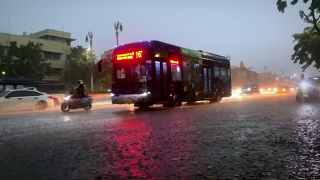 Traffic-in-the-monsoon,-rainy-season-in-Bangkok-Thailand-with-the-whole-street-flooded