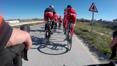 Cycle-training-Calpe-Spain-pro-cyclists-in-a-group-on-a-country-road-in-Spain-in-winter