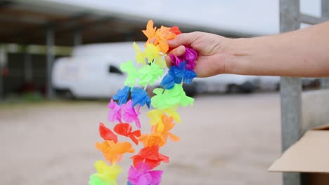 A-colorful-Hawaiian-flower-necklace-in-slowmotion