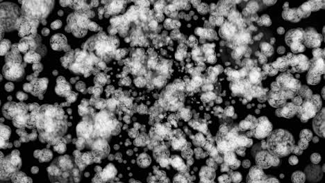 Simulación-De-Moléculas-Con-Partículas-Que-Aparecen-Y-Desaparecen-Lentamente-A-Medida-Que-La-Simulación-Gira.