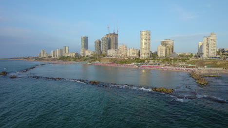 The-famous-Bat-Yam-rock-Beach---The-lagoon-is-formed-by-wave-breakers-and-most-of-its-visitors-are-families-with-children-because-of-the-shallow-water-and-the-lack-of-waves
