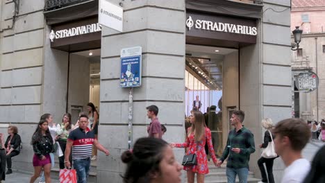 Pedestrians-and-shoppers-are-seen-at-the-Spanish-women's-clothing-fashion-brand-from-Spain-owned-by-the-Inditex-group,-Stradivarius-store