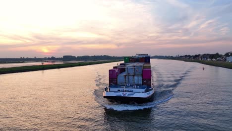 Golden-hour-sky-above-the-Noord-River-and-the-cargo-ship-the-Crigee