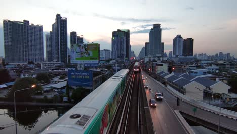 Top-View-of-BTS-Sky-Train-Transportation-with-Bangkok-City-View-as-Background