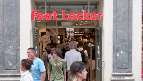 Shoppers-are-seen-at-the-American-multinational-sportswear-and-footwear-retailer,-Foot-Locker-store