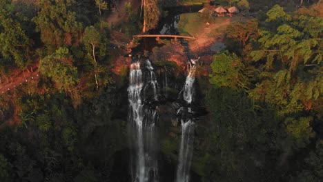 The-Tad-Gneuang-Waterfall-at-Loas-during-sunset,-aerial