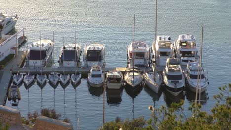 Calpe-Spain-the-marina-with-hire-fishing-boats-moored-in-late-evening-winter-sunshine