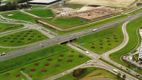 Aerial-drone-shot-of-a-Dutch-highway-intersection