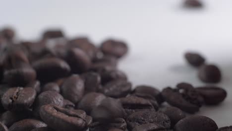 Delicious-Ecuadorian-roasted-coffee-gently-falling-from-left-to-right-in-a-slow-and-seductive-motion