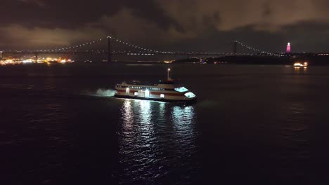 Ferry-boat-crossing-river-at-night