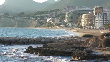 Calpe-beach-Spain-people-enjoying-the-last-sunshine-on-a-warm-winter-evening