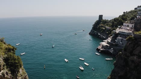 Drone-shot-flying-over-Italy's-Tyrrhenian-Sea-on-a-sunny-day