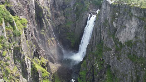 Voringfossen-Waterfall-in-Norway---Scenic-Nature-Landscape-in-Eidfjord,-Vestland---Aerial-Pedestal-Up