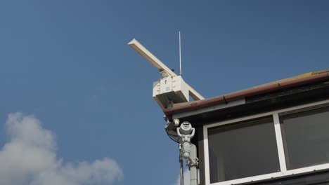 Close-up-of-antenna-atop-an-inshore-rescue-building