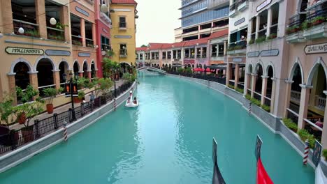 Located-in-the-Bonifacio-Global-City-development,-this-Venice-themed-commercial-complex-features-luxury-brand-stores,-international-food-bazaars,-gondola-rides-and-mimes,-for-a-memorable-experience