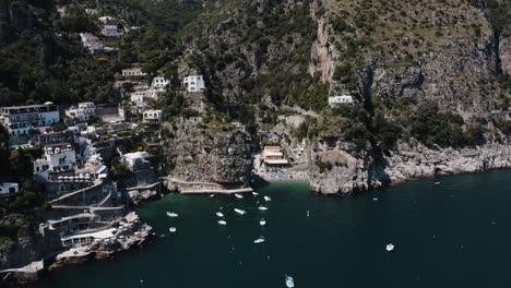 Wide-drone-shot-of-Praiano's-steep-coast-in-Italy