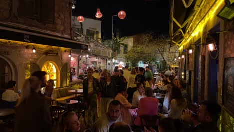 Vibrant-Bar-Street-in-Alacati-Town-in-Izmir-Region-of-Turkey-by-Night