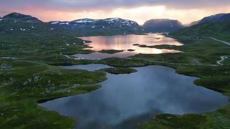 Sunset-Nature-Landscape-in-Norway---Stavatn-Lake-and-Snow-Covered-Mountains-Peaks---Vestland,-Vestfold-og-Telemark---Aerial