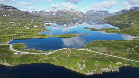RV-Camper-Motorhomes-at-the-water-in-Norway---Stavatn-Lake,-Vestland,-Vestfold-og-Telemark---Aerial