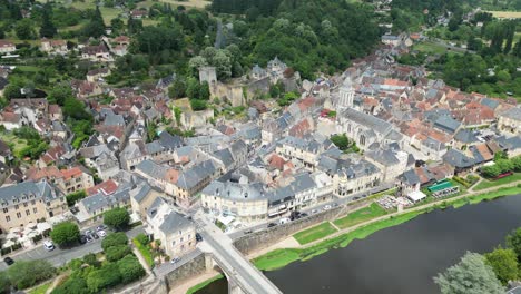 Pull-back-drone-aerial-reverse-reveal-Montignac-Lascaux-town-France-Drone-,-aerial-,-view-from-air