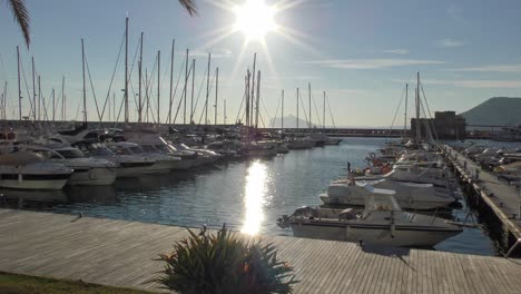 Calpe-Spain-late-afternoon-sunshine-on-boats-in-the-Marina-on-a-warm-winter-day