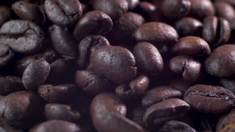 Exquisite-close-up-of-Ecuadorian-roasted-coffee-beans,-captured-in-4K-and-slow-motion-with-a-smooth-panning-camera-movement