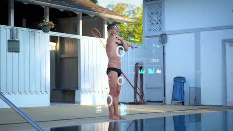 Digitale-Gesundheitscheck-Analyse-Eines-Sportlichen-Männlichen-Schwimmers-Am-Beckenrand-Während-Aufwärmaktivitäten