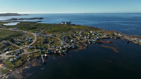 Scenic-Aerial-View-Over-the-Fishing-Village-Harbour-with-Ocean-Views-of-Joe-Batt's-Arm-from-Above-on-Fogo-Island,-Canada