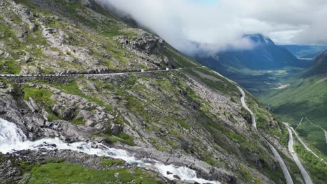 Trollstigen-Mountain-Pass,-Norway---Scenic-route-and-famous-tourist-attraction-in-Andelsnes,-Romsdalen-Valley---Pan-Right