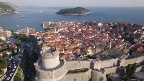 Aerial---Dubrovnik,-Croatia:-red-roofs,-Adriatic-Sea,-and-historic-castle