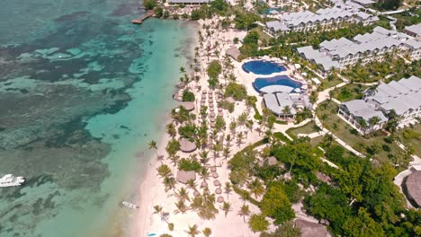 Private-beach-of-Hilton-hotel-at-Bayahibe,-La-Romana-in-Dominican-Republic
