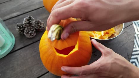 Close-up-of-male-hands-opening-and-closing-jack-o-lantern