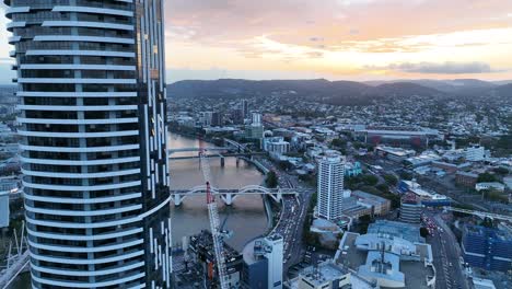 Aerial-shot-flying-above-Brisbane-CBD,-pull-away-revealing-Brisbane-Skyscraper-the-Meriton-Building