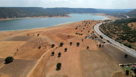 Drone-Wide-Angle:-Arid-Turkish-Lake-with-Patches-of-Greenery-and-Mounatains