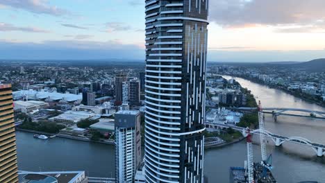 Aerial-shot-orbiting-Meriton-Suites-Herschel-Street,-Brisbane-City-SkyScraper