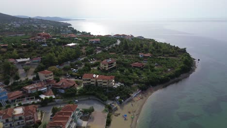 An-exquisite-4K-drone-video-showcasing-the-splendor-of-Gerakini-Beach-in-Yerakini,-Halkidiki,-Greece,-during-the-day