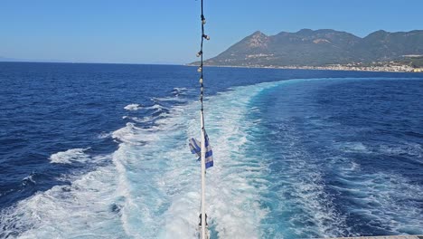 Greek-flag-on-a-boat-in-the-Aegean-sea