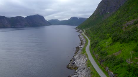 Scenic-coastal-road-of-Mefjord-on-Senja,-overcast-day-during-summer