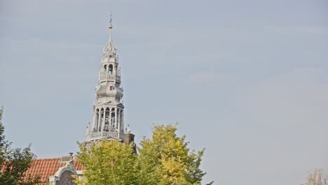 Tilt-down-from-the-Old-Church-Tower-in-Amsterdam-towards-a-beautiful-canal