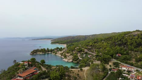 Above-the-Waves:-Spathias-Beach-in-Nikiti,-Greece---4K-Drone-Showcase