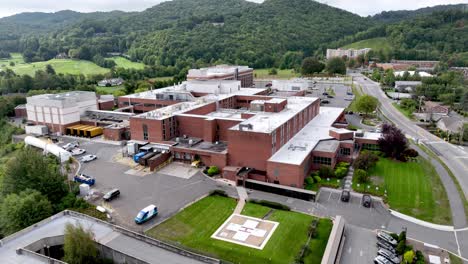 aerial-push-in-over-the-helicopter-pad-at-appalachian-regional-healthcare-in-boone-nc,-north-carolina