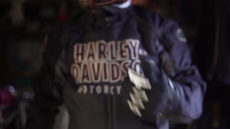 Dangerous-gang-member-wearing-Harley-Davidson-motorcycle-jacket,-handheld-dolly