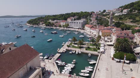 Aerial-pan-view-of-historic-port-of-Hvar-in-Croatia-in-Adriatic-Sea