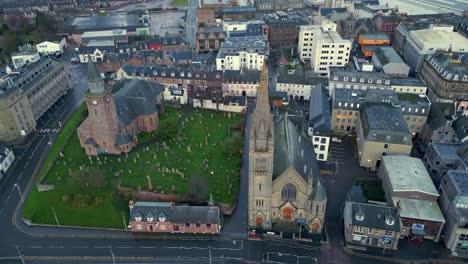 Aerial-view-of-historic-sights,-old-churches-and-cemetery